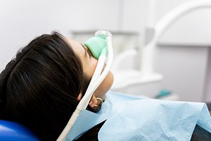 Lady is sedated for dental treatment