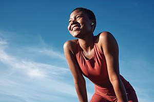 Lady smiles outdoors